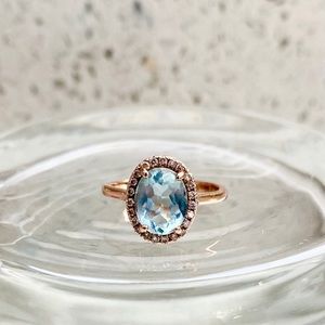 Aquamarine and diamond engagement ring